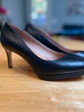 Corso Como Lara black leather platform pumps.